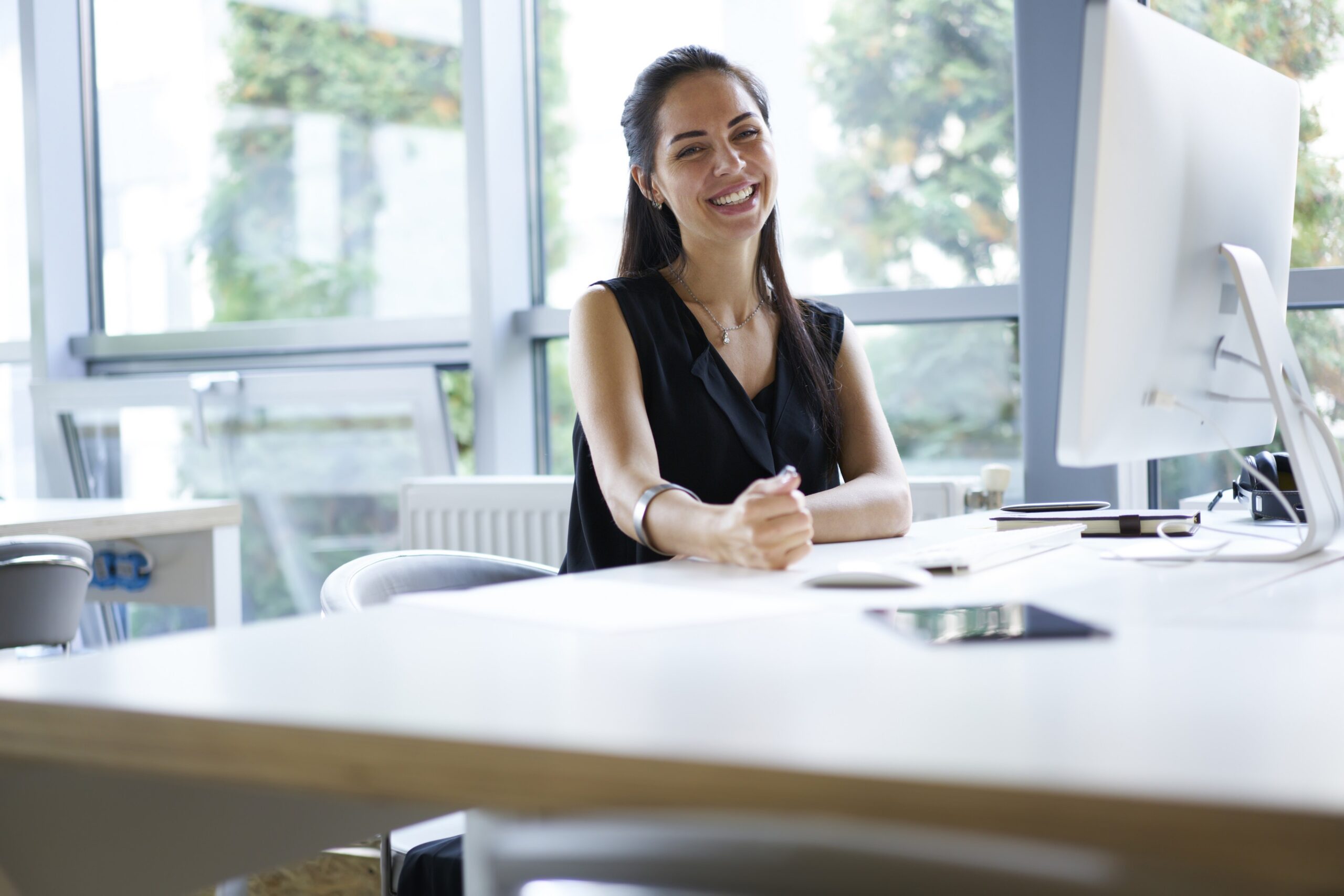 Confident women satisfied with the Audit Trails in her Construction Payments thanks to Payapps